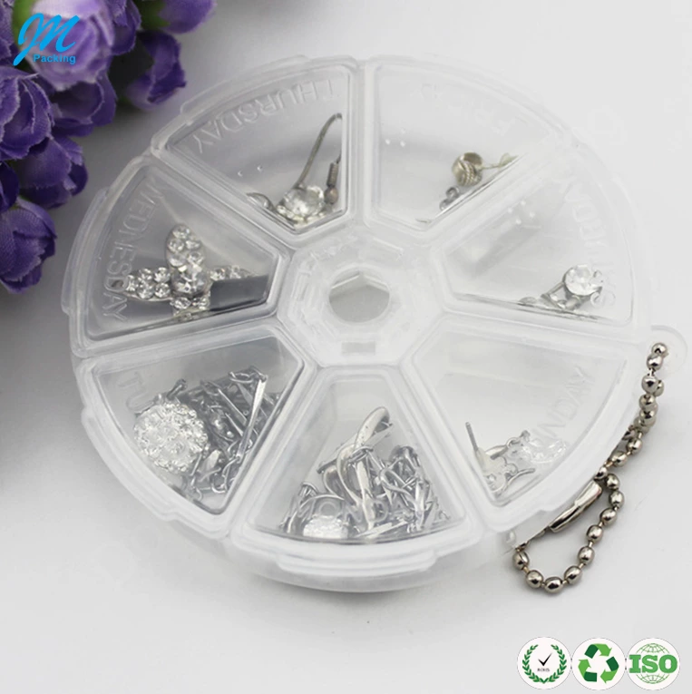 Wholesale beautiful original colorful 7 days round portable travel plastic pill box