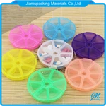 Wholesale beautiful original colorful 7 days round portable travel plastic pill box